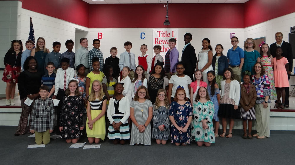 Memorial Drive Elementary School Inducts 27 NEHS Students
