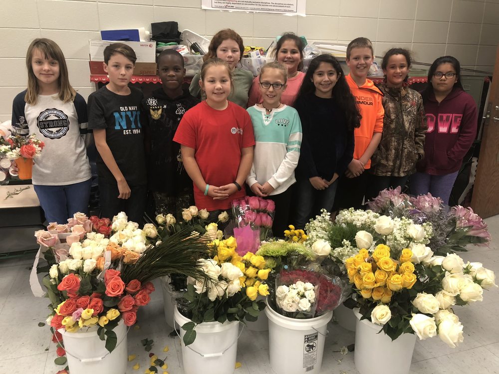 NEHS Students with Flower Donation