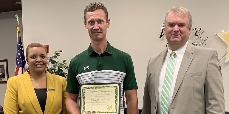A photo of Christopher Musgrove receiving Golden Achievement Award