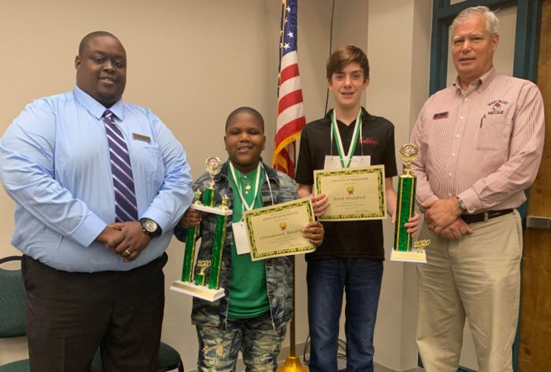 Chrishaud and Kent are pictured with their principals