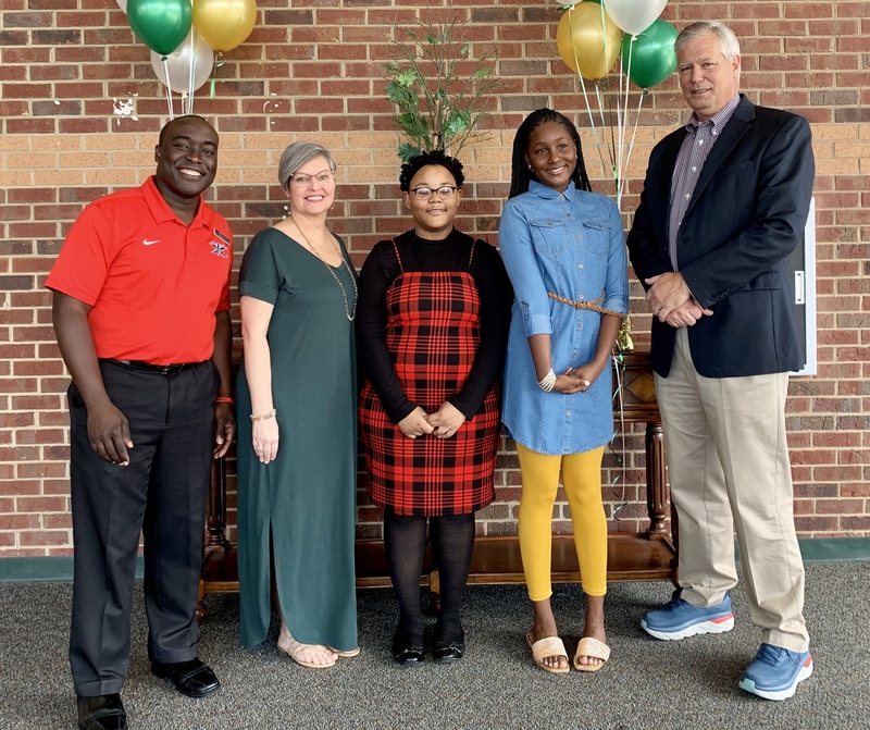 Class of 2026 Scholars Destiny A. and Ma'Kel T.with WXMS Staff Members Clarence Washington, Tammy Boyette, and Principal David Hitt