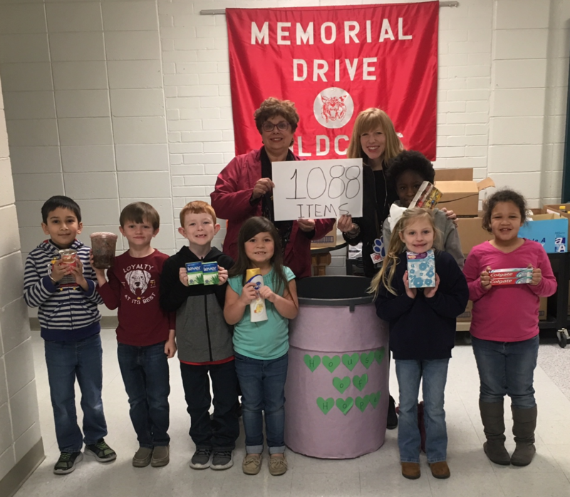 Memorial Drive students shown with donations